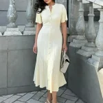 Elegant Knitted Suknelė Moterims Solid Single Breasted O Neck Short Sleeve High Liemuo Hip Package Suknelės 2025 Autumn Chic Robes Lady